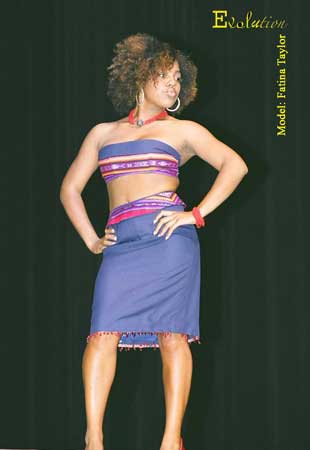 Navy 2-piece top with skirt and ethnic trim.