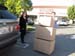 Melanie McFarland and Arnold unloads the next batch of boxes.