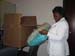 Facility Adminstrator of dialysis center takes a sneak peek of the fabulous pillowcases made‚ “Thank You!”