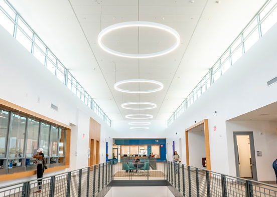 Interior of campus building with students.