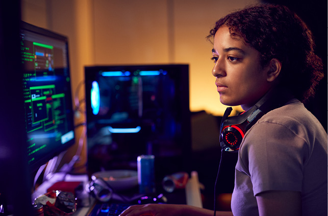 Woman looking at computer monitor