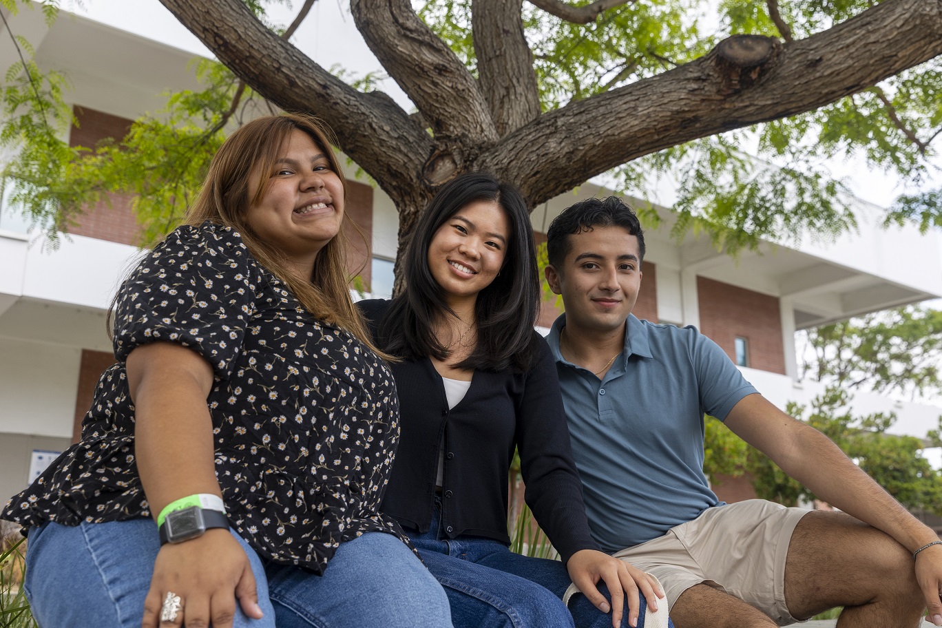 El Camino Outreach Ambassadors smiling under a tree