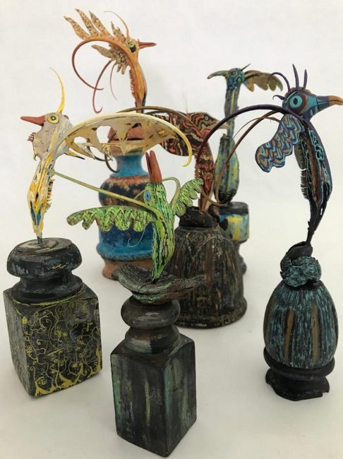 WS Milner; We Are All The Same; wood, dried devil’s claw seed pod, polymer clay, acrylic epoxy, acrylic and oil paints; 6-20" x 4-10" diameter
