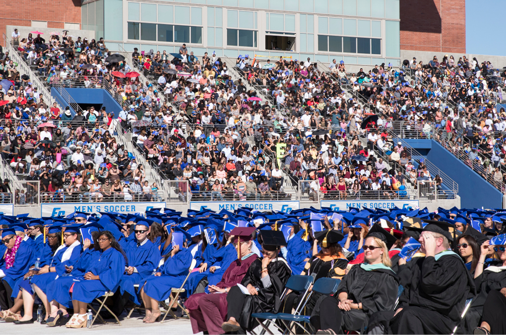 Guests in the stands at commencement.