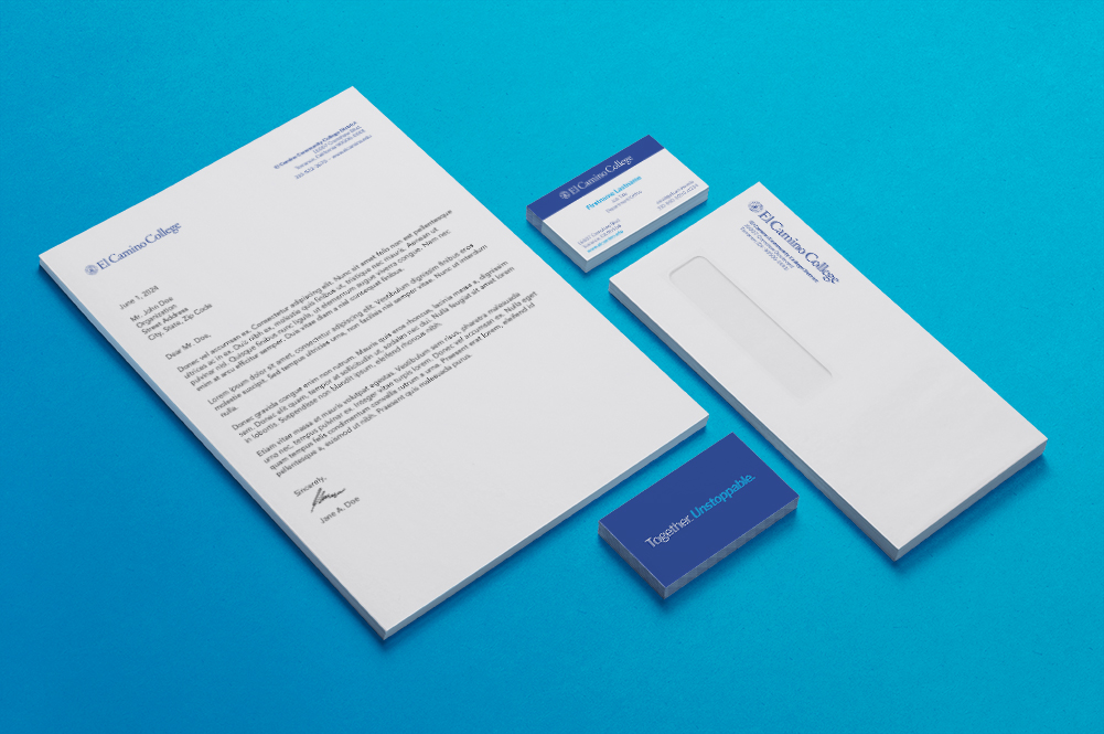 El Camino College letterhead paper, envelope and business cards on display.