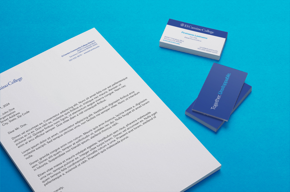 Letterhead paper and business cards on display.