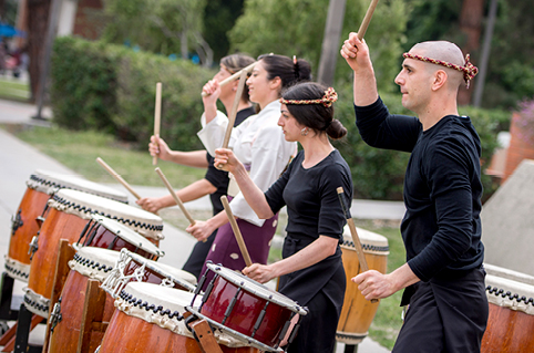 Musicians playing the taiko drums
