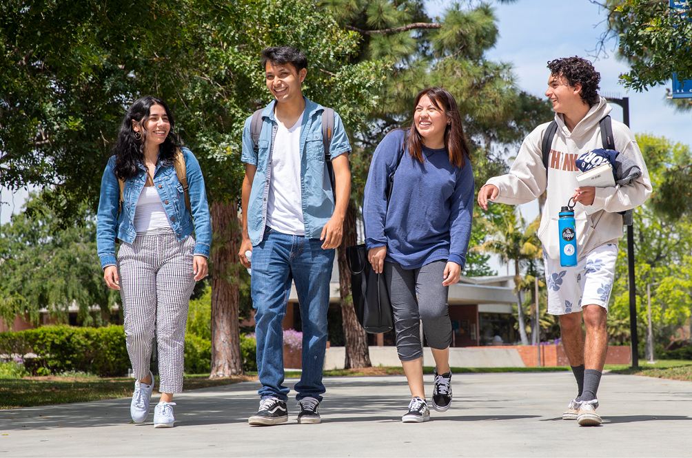Students walking outside on campus.
