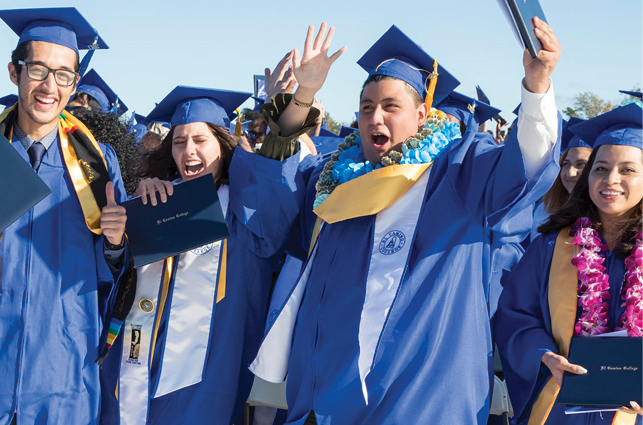 Grads at commencement celebrating.